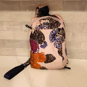 Limited addition Anna Sui for Tumi Brive sling backpack.